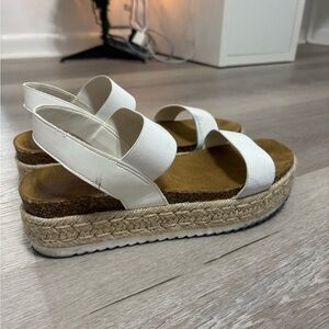 Steve Madden Jaklin wedge sandals with elastic straps.